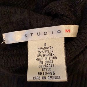 Black turtle neck sweater